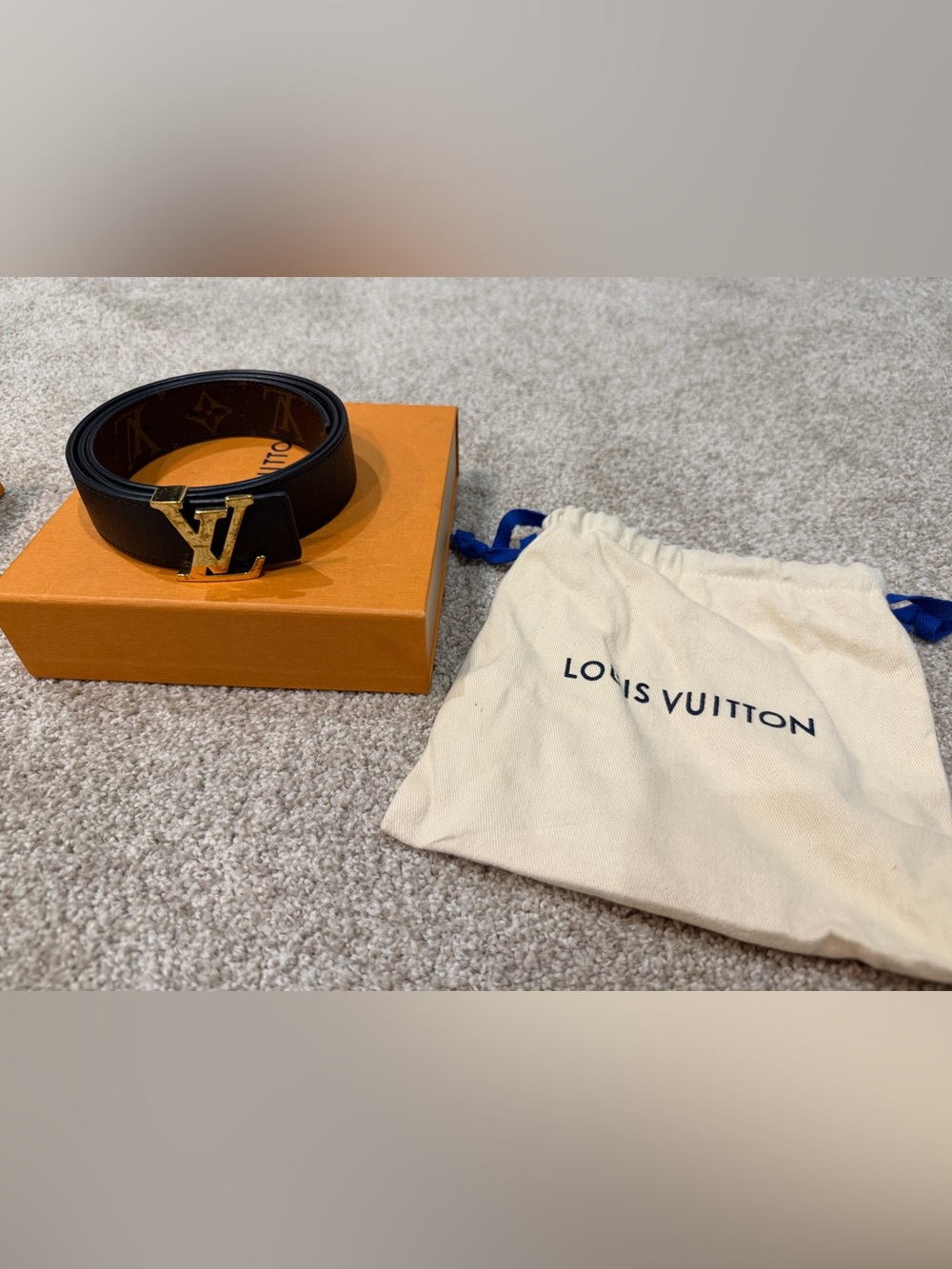 Louis Vuitton women’s Black Reversible Leather Belt with Gold LV Buckle